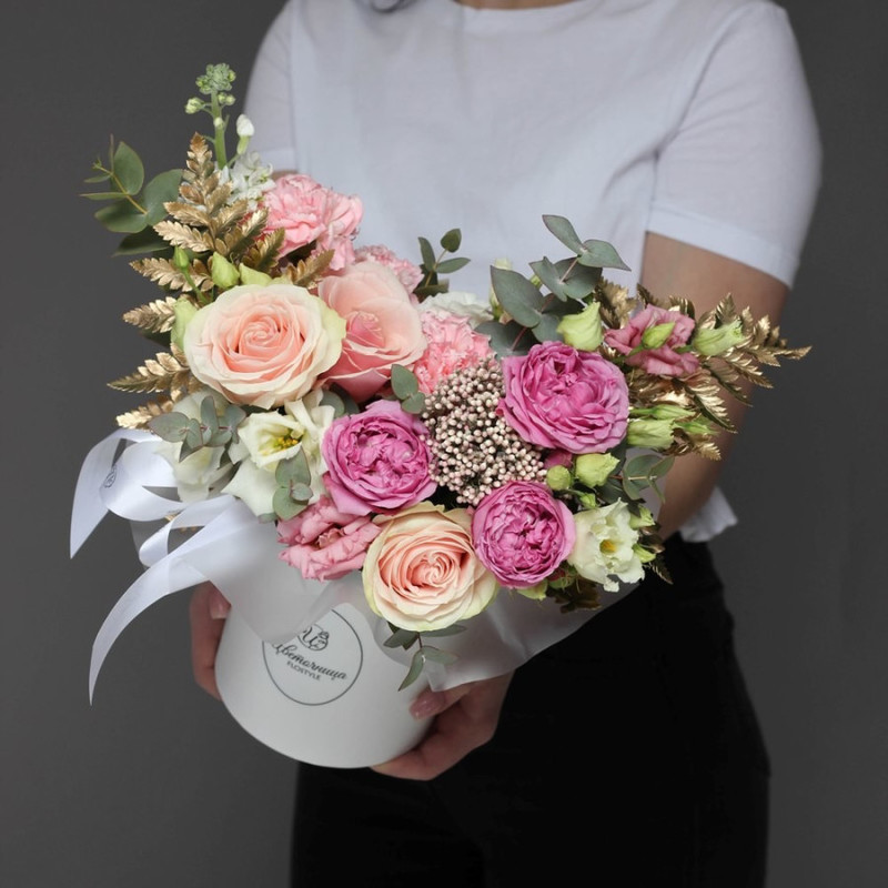 Bouquet of flowers in a box. Peony bush roses, eustoma and pink rose Diva, standart