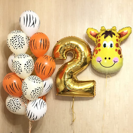 Safari balloons for a children's party with a giraffe and a number