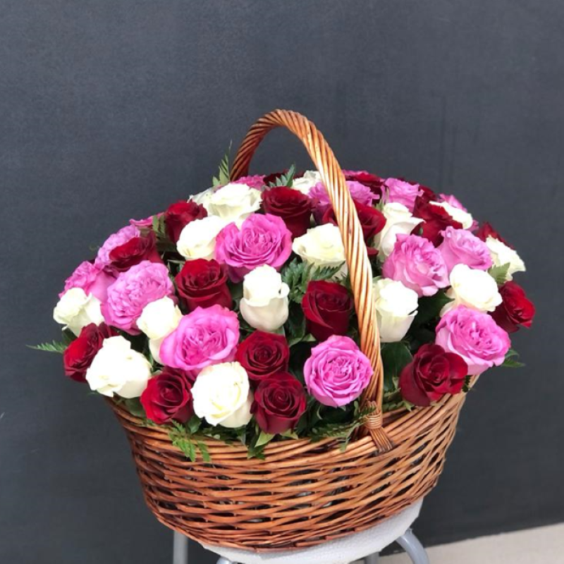 Multicolored roses in a basket, standart