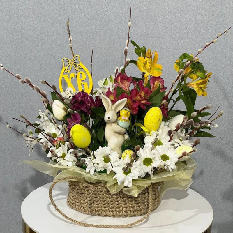 Easter composition of natural flowers and willow, standart