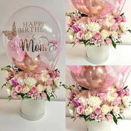 Bouquet of Roses and chrysanthemums with a balloon for mom