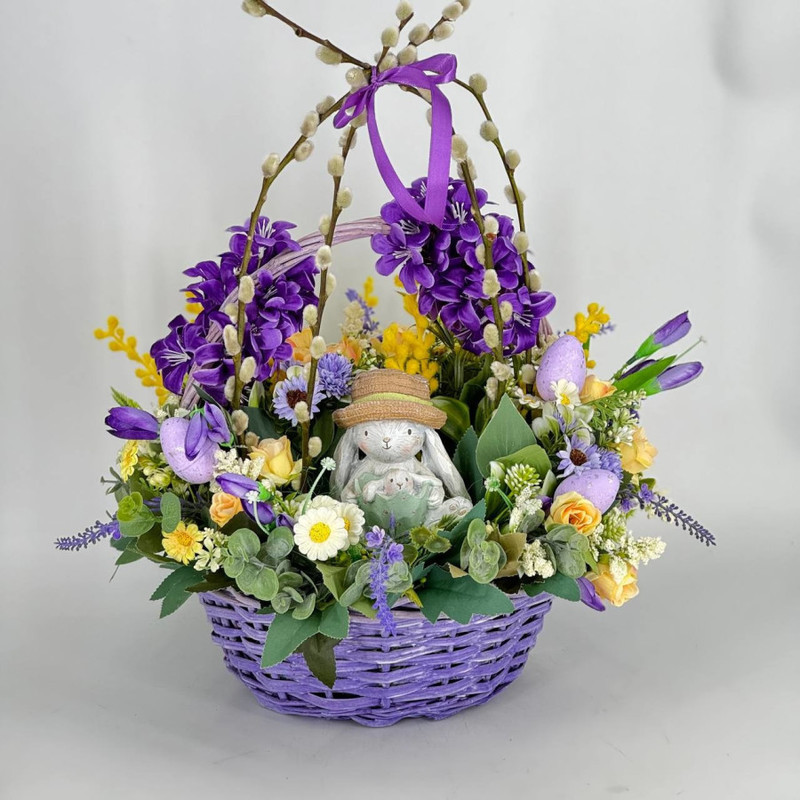 Easter composition of artificial flowers with natural willow branches, standart