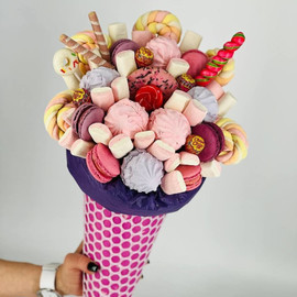 Children's bouquet of sweets in a cone