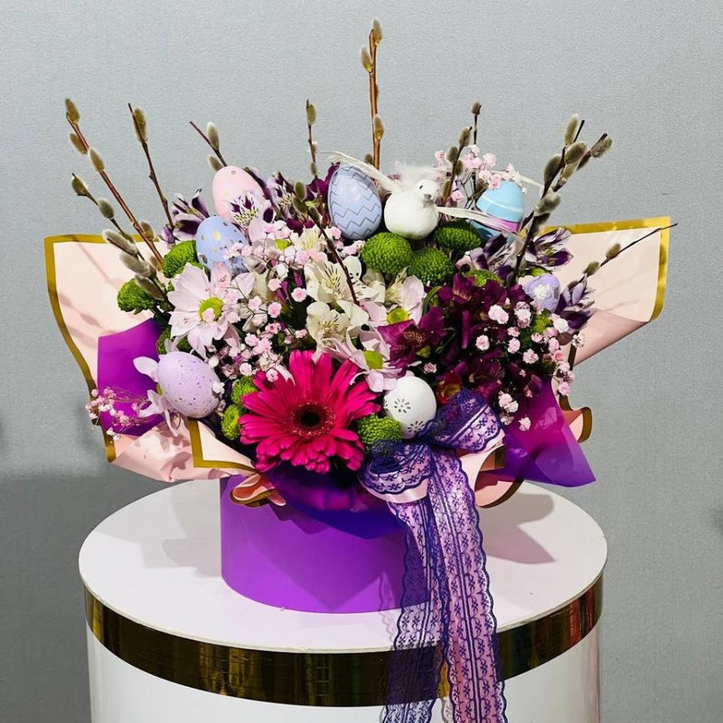 Bouquet of flowers with sprigs of flowering willow in a hat box, standart