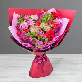 Bouquet of colorful roses, chrysanthemums and alstroemerias