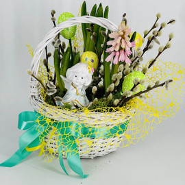 Easter composition in a basket with willow and hyacinths