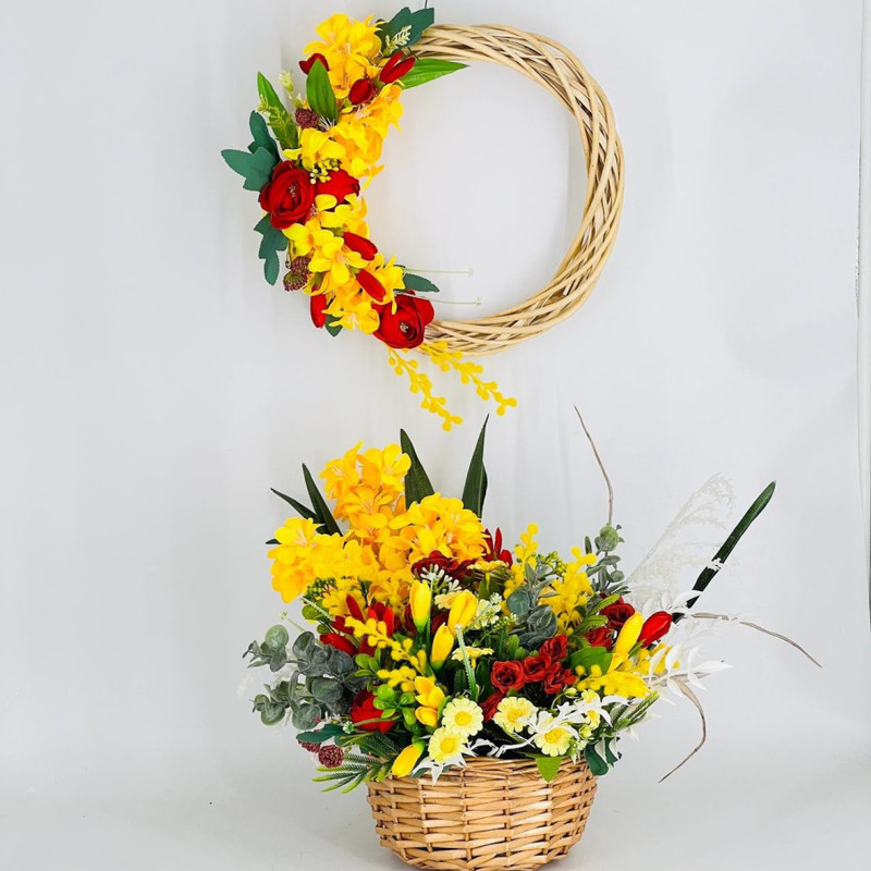 Easter composition handmade wreath and bouquet of artificial flowers in a flower basket, standart