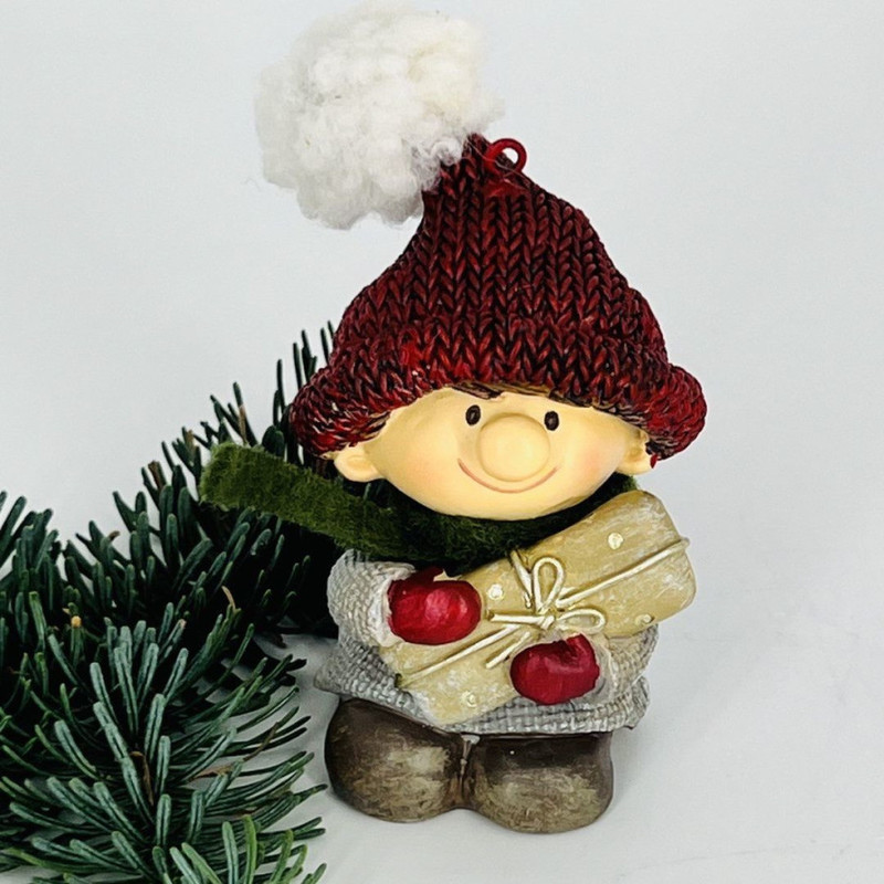 New Year's souvenir gnome with a gift, standart