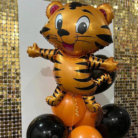 A set of balloons with a tiger cub