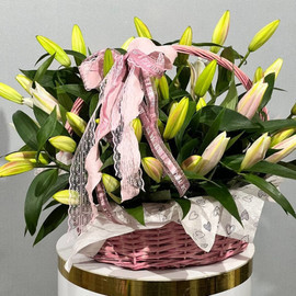 Large basket of pink fragrant lilies
