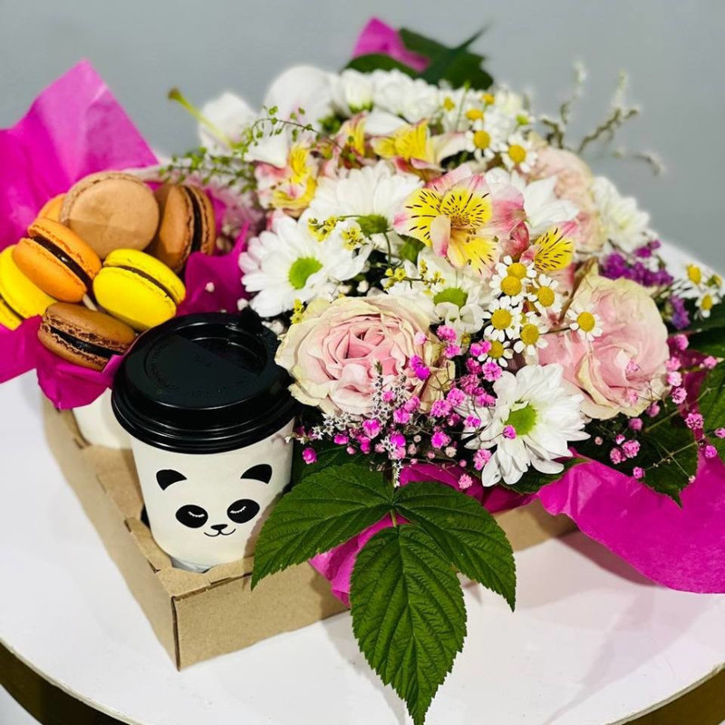 Macaroni cakes with flowers and coffee, standart