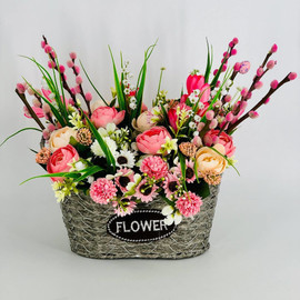 Designer bouquet of artificial flowers with natural willow