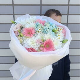 Hug Bouquet of Daisies, mini gerberas and snow-white chrysanthemums of Gerbera Chamomile Hydrangea