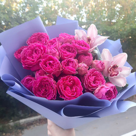 Bouquet of peony roses and orchids