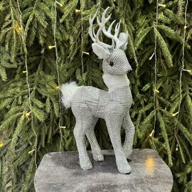 Олень блестящий под елку