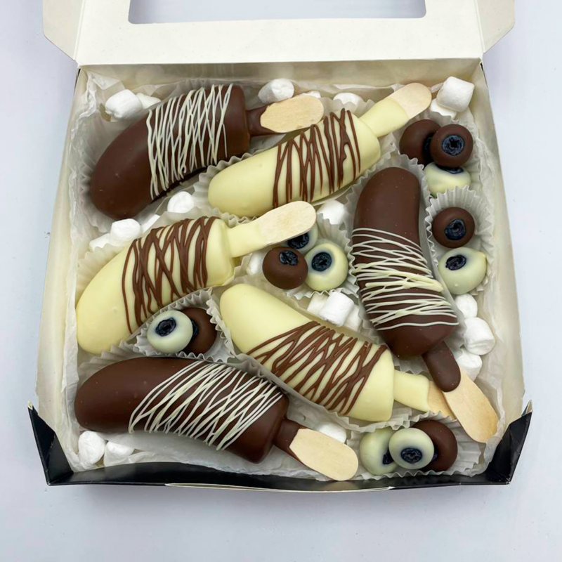 Набор бананы в белом и молочном шоколаде с черникой арт. 35351, набор бананы в белом и молочном шоколаде с черникой арт. 35351