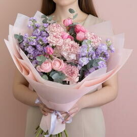 Bouquet of fresh flowers made of pink roses, hydrangeas, lavender mattiola and dianthus