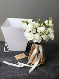 Delicate bridal bouquet with dianthus and eustoma