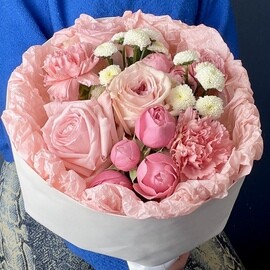 Delicate bouquet of peony-shaped roses, carnations and chrysanthemums