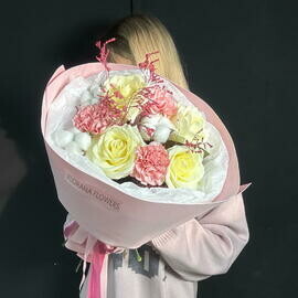 Bouquet "pur-pur" of white roses and pink dianthuses with cotton in a pink package