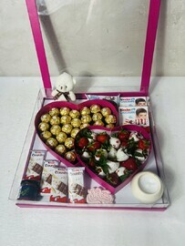 Luxury box of chocolate-covered strawberries and sweets 