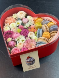 Big heart with flowers and sweets