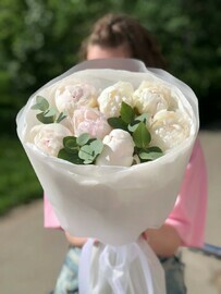 Fragrant white peonies with eucalyptus