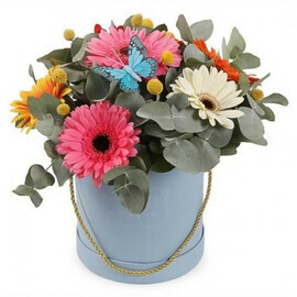 Box with gerberas and eucalyptus