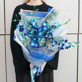 Bouquet of blue orchid with eucalyptus in a gift box "Sapphire Dream"