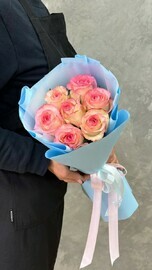 Monobucket made of pink roses in an elegant package
